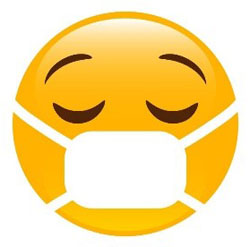 A yellow face emoji with eyes closed wearing a face covering.