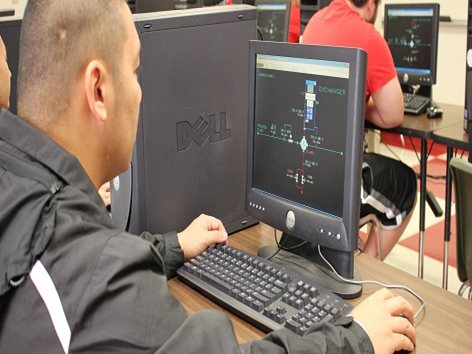Student working at a computer.