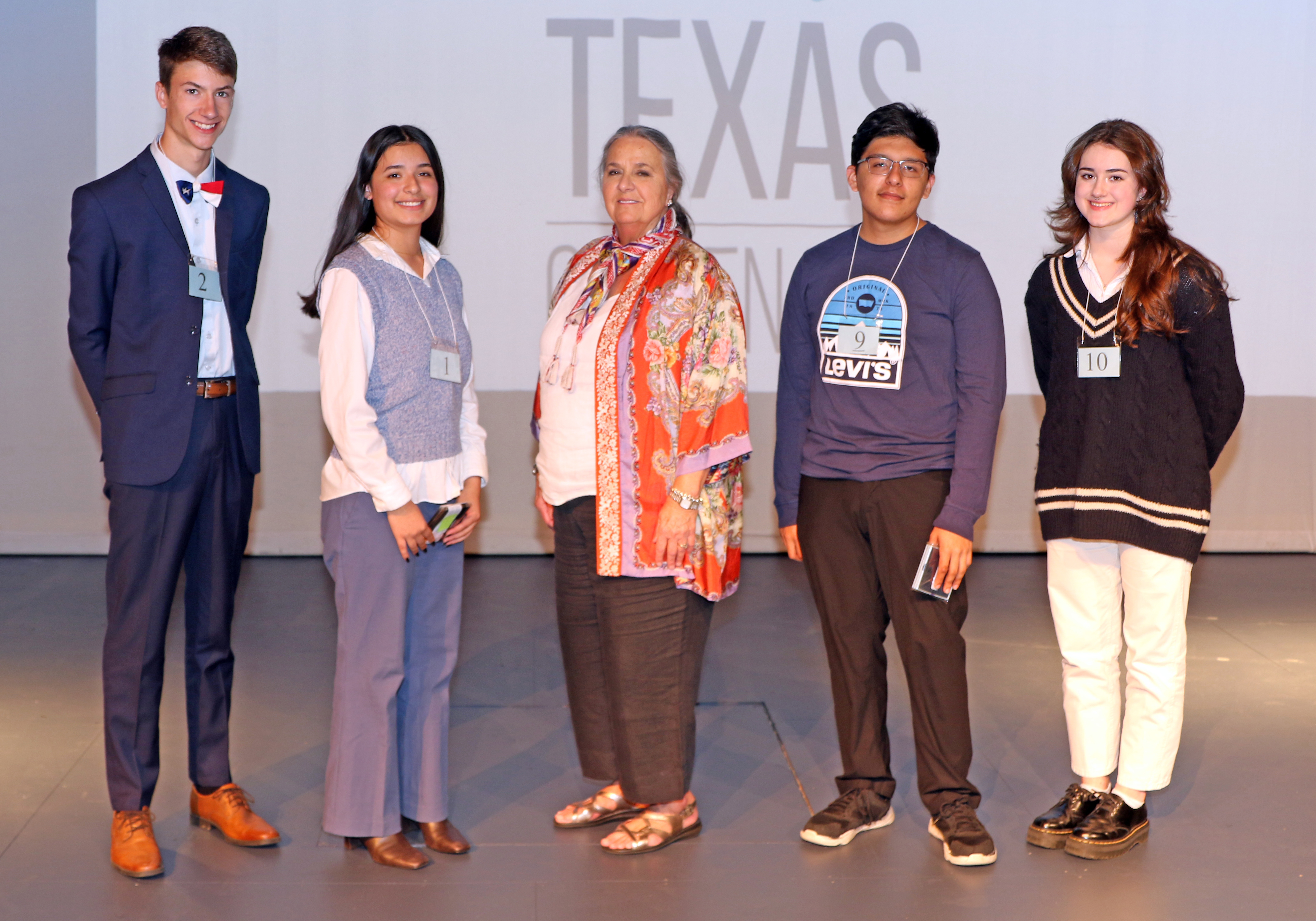 2022 Citizen Bee winners, from left, Nate Gibson, first place; Christina Marquez-Pereda, second place; LSCPA Coordinator Dr. Tina Capeles; Bryan Rocha, third place; and Olivie de La Madrid, fourth place.