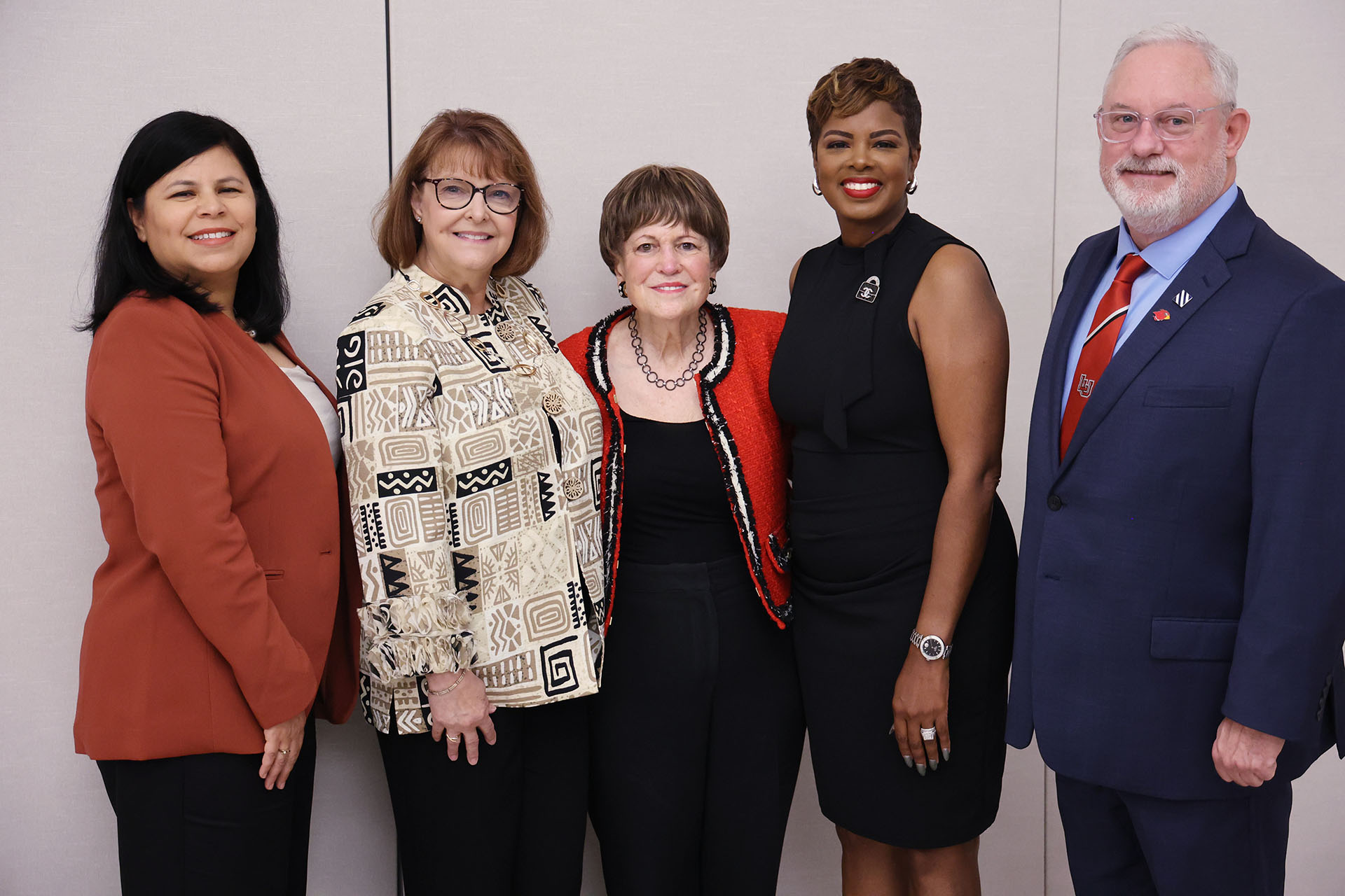 Toy Thornton-Wyckoff is recognized by Regina Rogers with other awardees