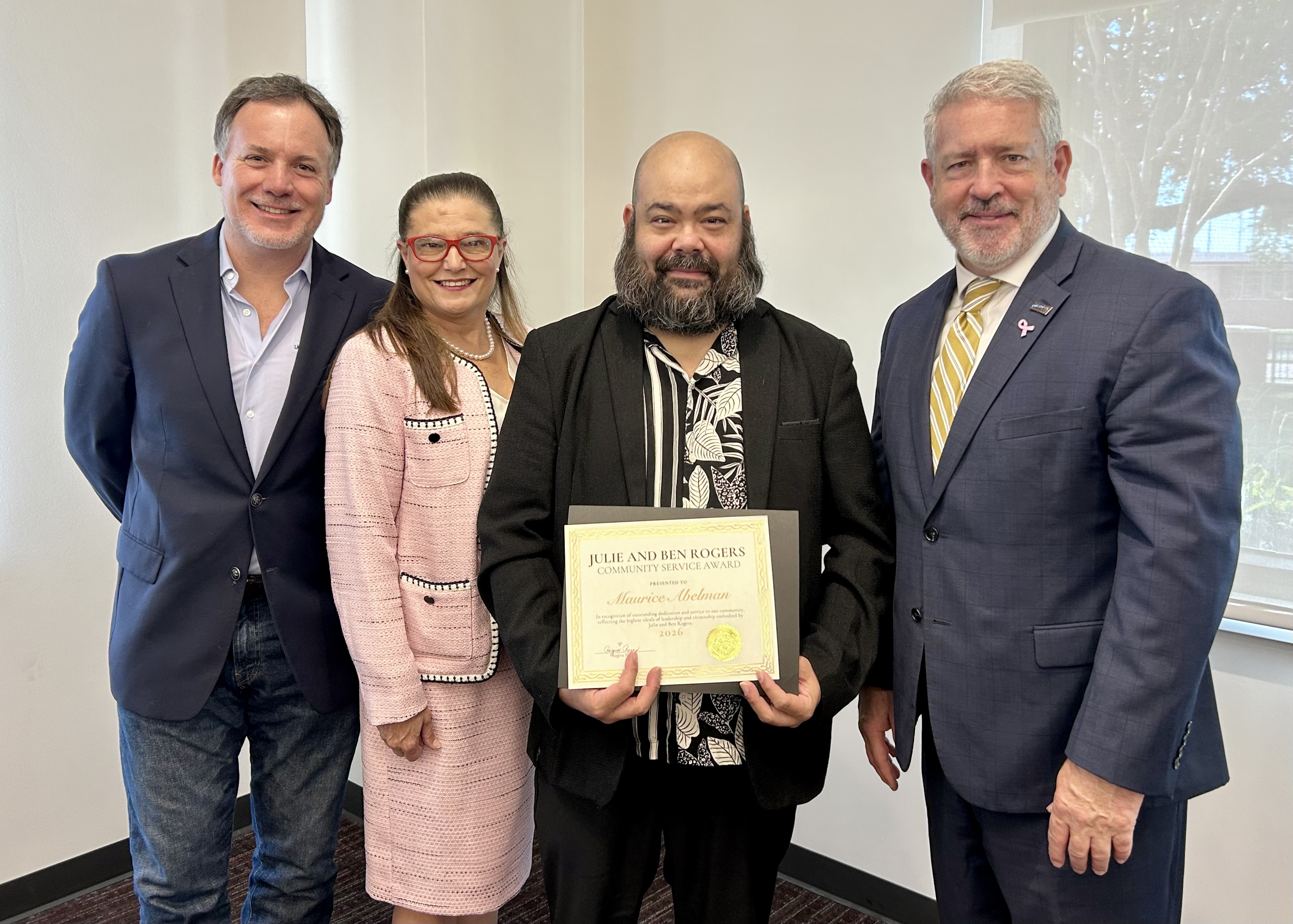 Maurice Abelman receives award flanked by Blas Canedo-Gonzalez, Melissa Armentor and John Hayek