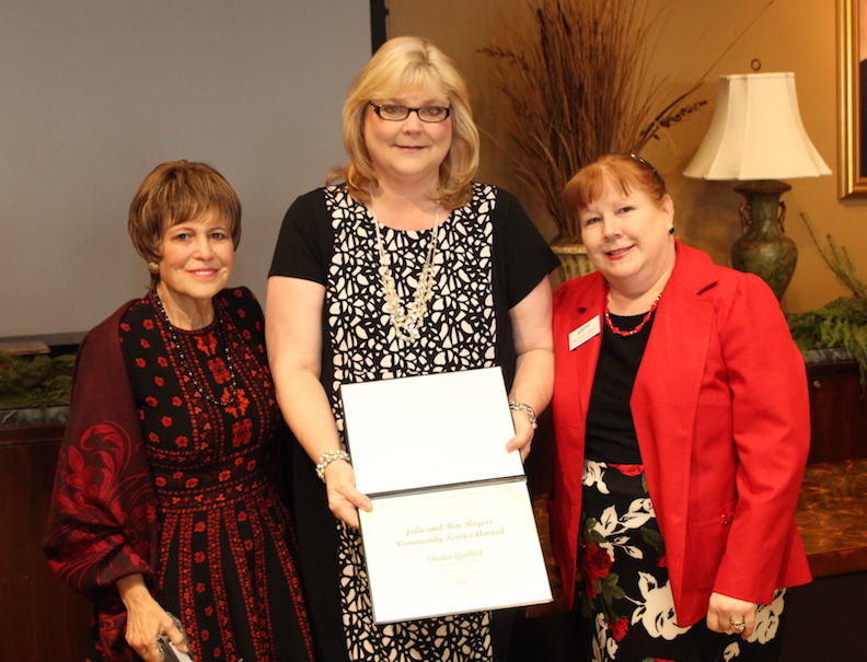 Regina Rogers, left, and Dr. Pamela Millsap, Lamar State College Port Arthur Vice President, right, present Sheila Guillot with the Julie and Ben Rogers Community Service Award Thursday, Dec. 12 at Lamar University in Beaumont. Guillot, Chair of Business and Industrial Technology at LSCPA, was one of four recipients for 2019.