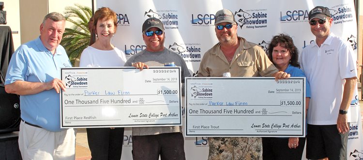 The Parker Law Firm team of Brian Quebedeaux and Michael Fesco won first place in the Sabine Showdown Fishing Tournament Redfish and Trout categories. Pictured, from left, are Tournament Director Scott Street, Lamar State College Port Arthur President Dr. Betty Reynard, Quebedeaux, Fesco, Verna Rutherford representing title sponsor Motiva Enterprises, and Dana Hanning representing title sponsor Flint Hills Refinery.