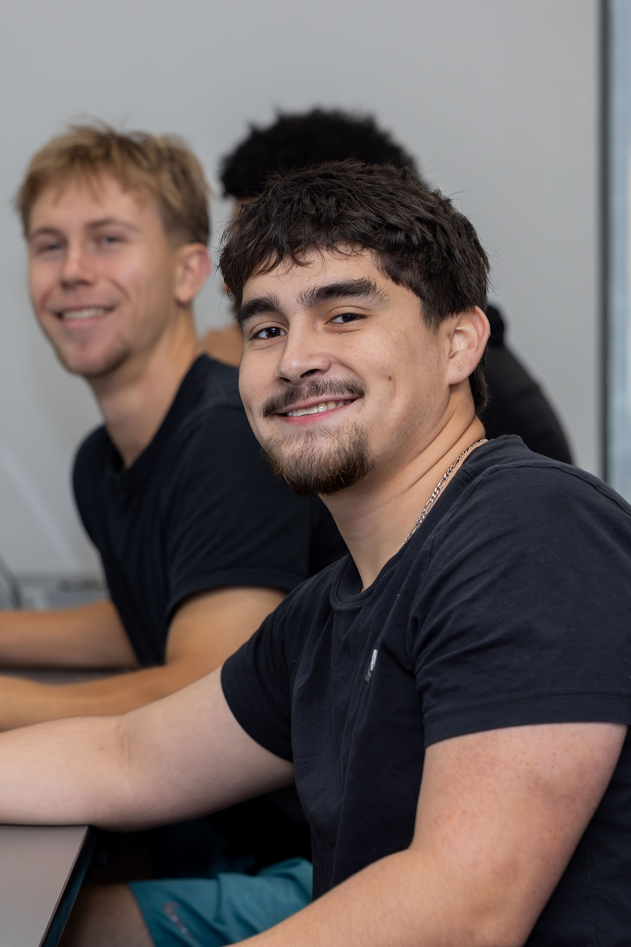 Young men in class