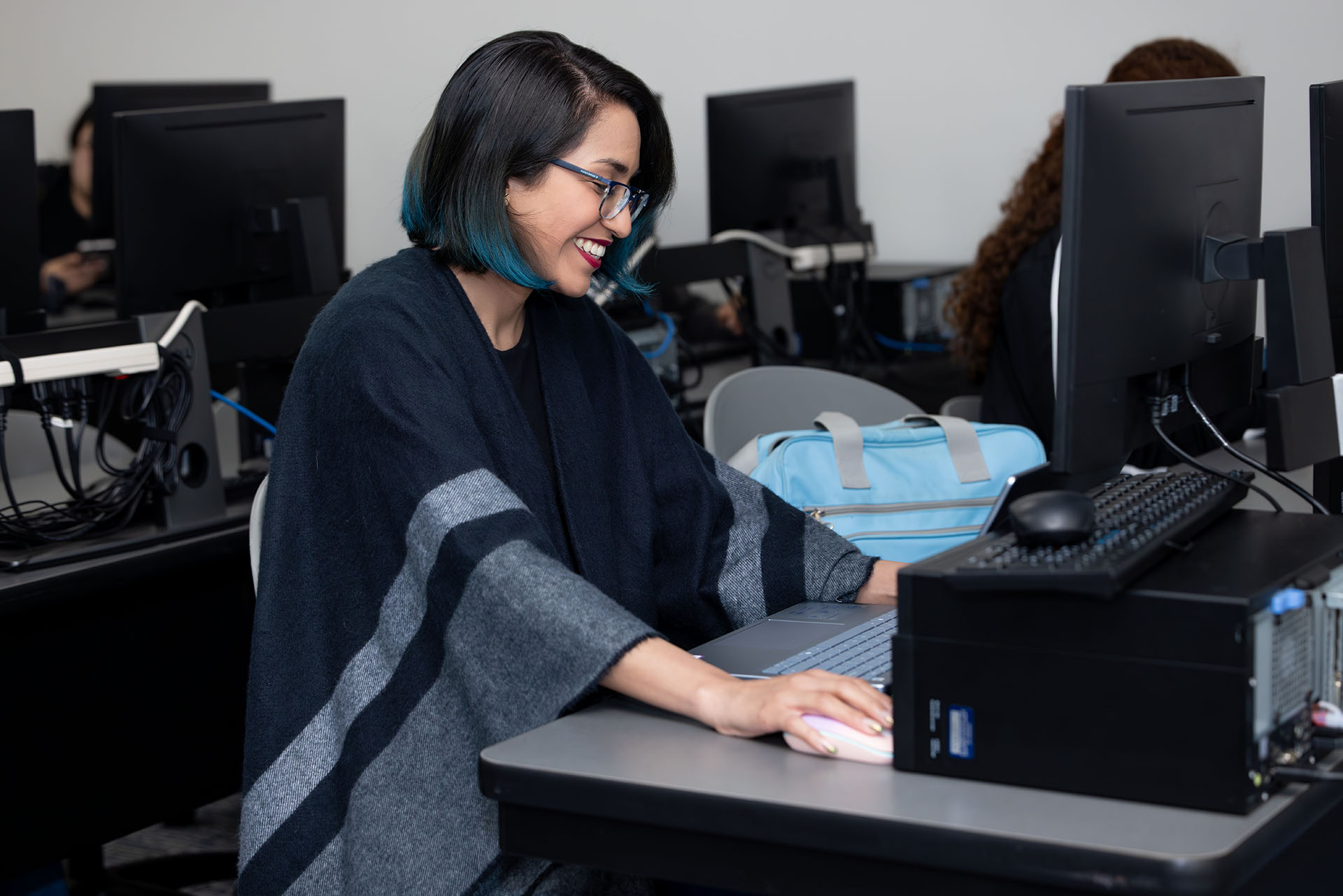 Woman works at computer